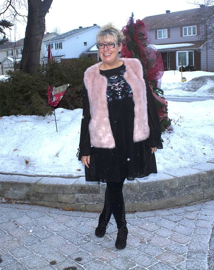 a fun pink fur vest and an embroidered smock dress from Target. With Svelte leather leggings and black skecher wedges
