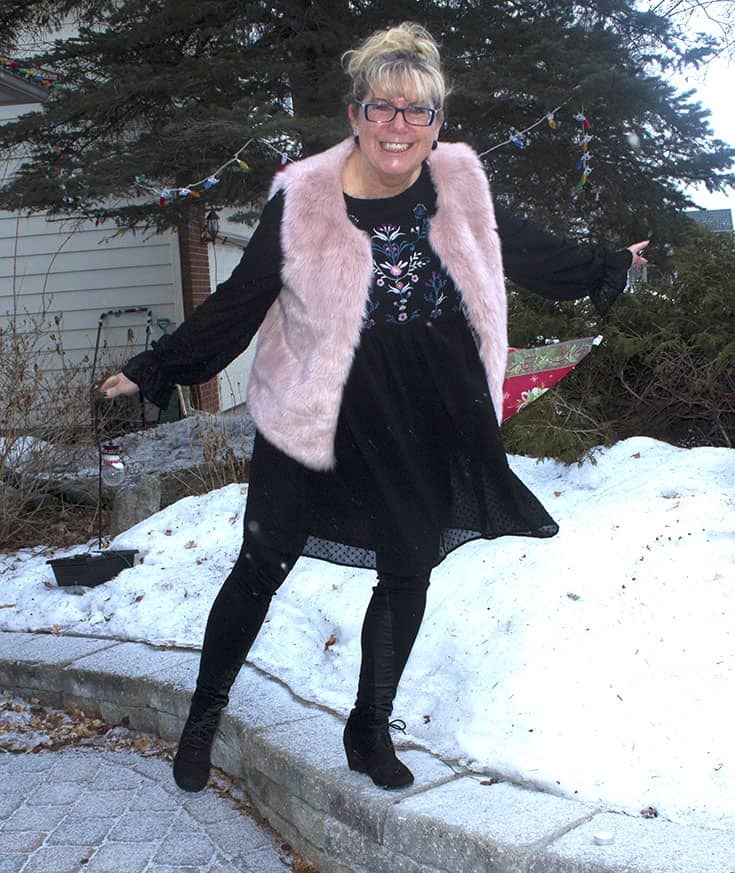 Floral smock dress from Target with a fun pink fur vest and skecher wedges